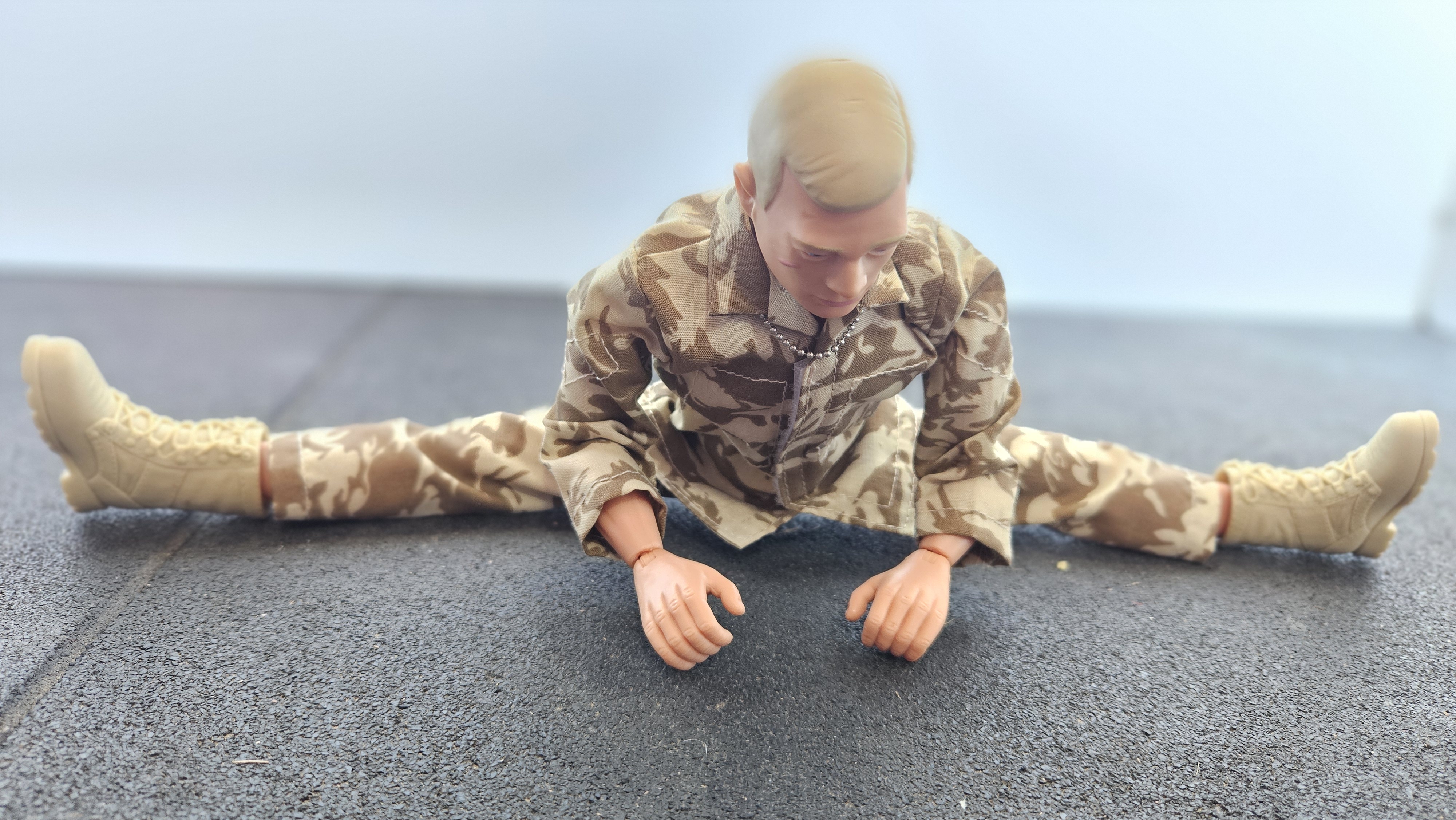 Action Man doing Wide-Angle Seated Forward Bend